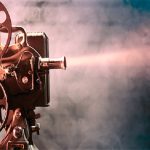 old film projector with dramatic lighting